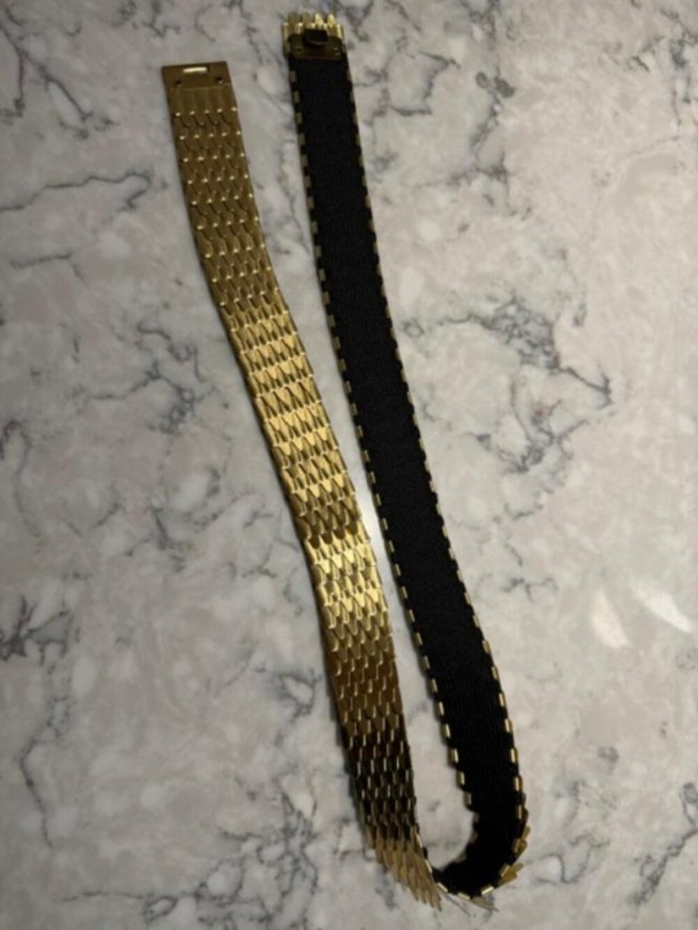 Gold Tone Metal Articulated Stretch Designer Belt. 27 Inches Long.